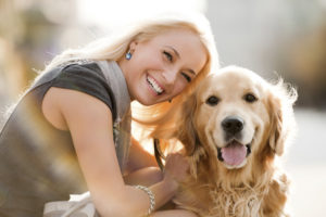 Close-up of a beautiful blonde woman with her golden retriever. 

[url=http://www.istockphoto.com/search/lightbox/9786797][img]http://dl.dropbox.com/u/40117171/people-animals.jpg[/img][/url]